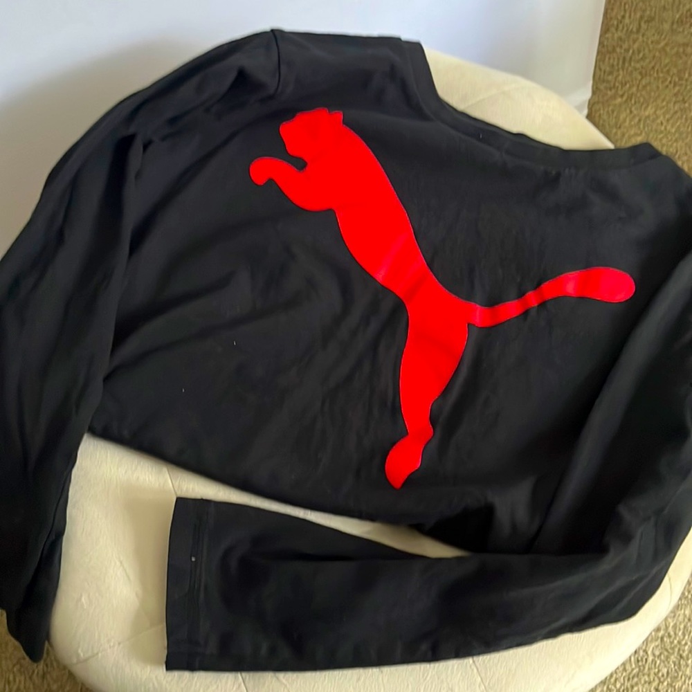 Puma brand long sleeve boys tee in black with red graphic design
